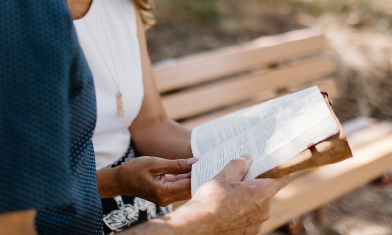 Husband and wife holding bible