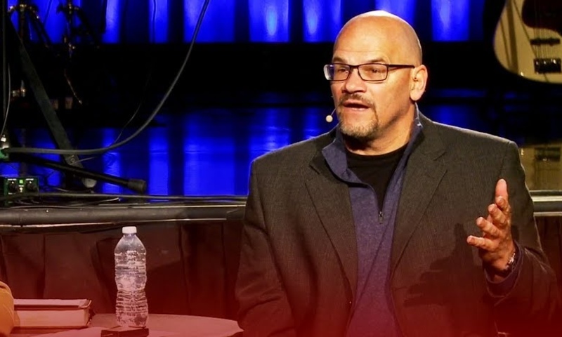 image shows Tim Muehlhoff speaking