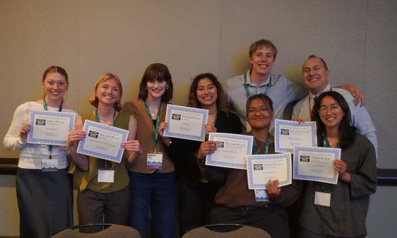 image shows the students with their awards 