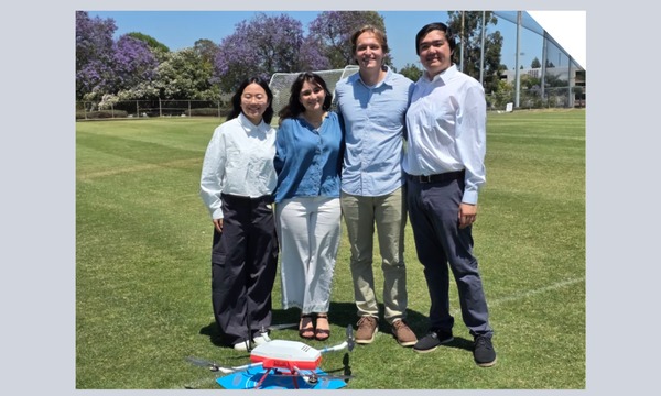 image shows the team who made the drone