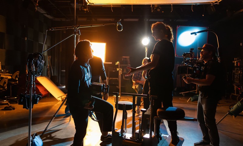 Image shows students working on a set