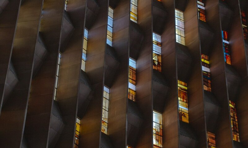 image shows a variety of stained glass windows