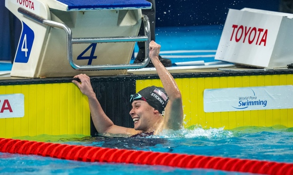 image shows Morgan Stickney in the water after winning the championship