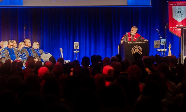 image shows President Corey addressing Biola at Convocation