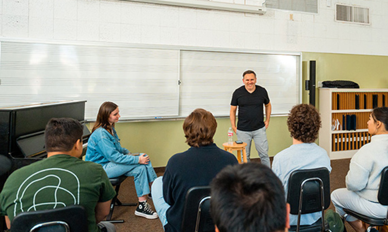 Matt Redman teaching in a classroom