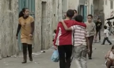 children walking down an alley