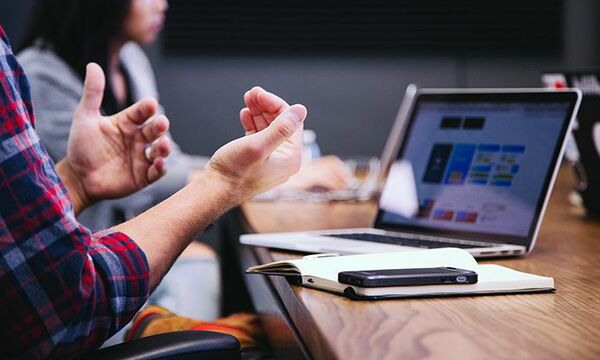 stock photo of arms and laptop