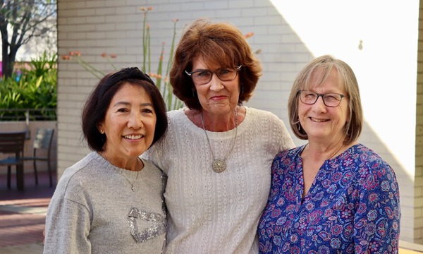 image shows the three alumnae