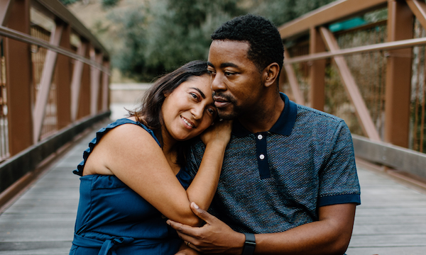 Wife leaning head on the shoulder of husband