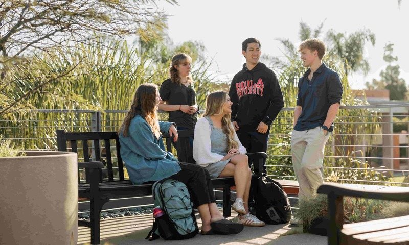 Five students gather at the Talbot East Rooftop Garden