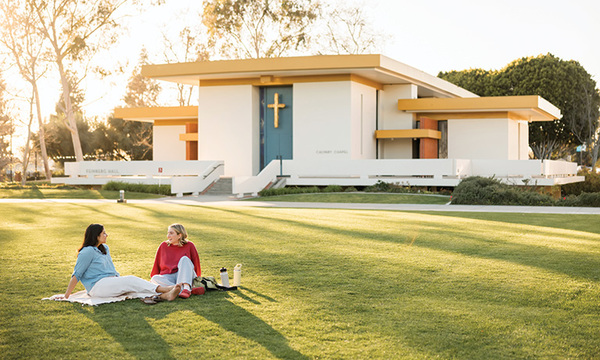 two students in front of Calvary Chapel