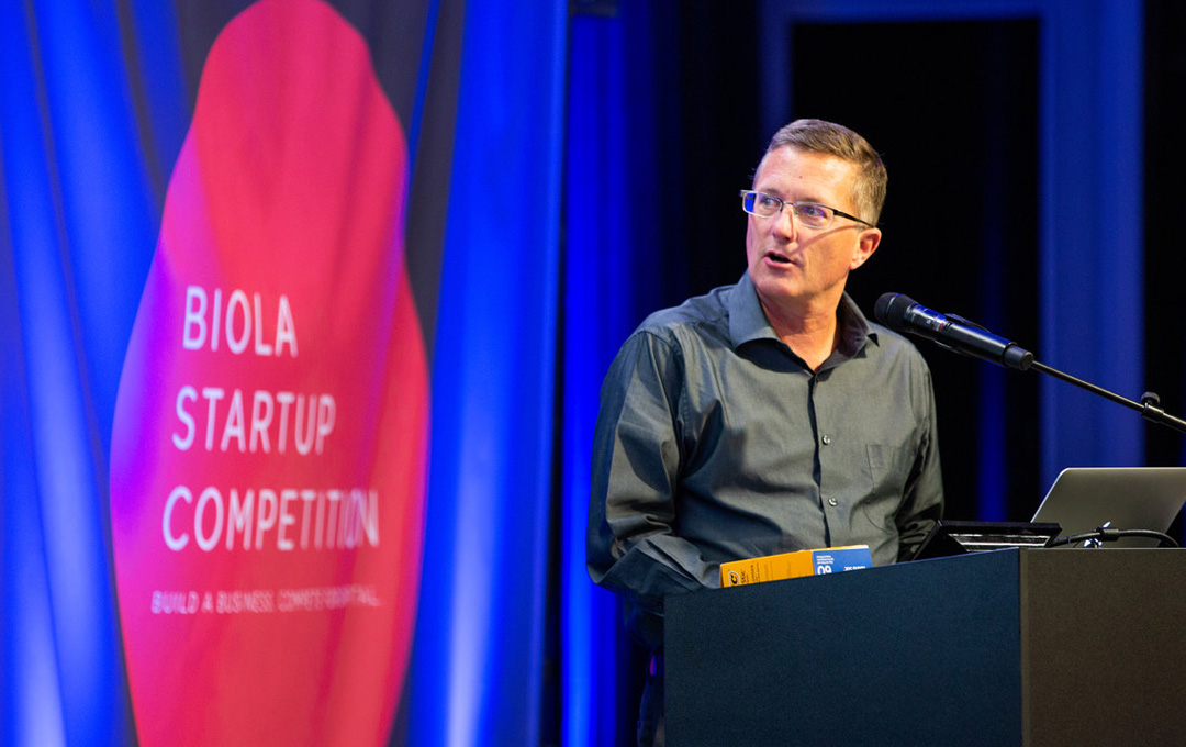 Man speaking at Biola Startup Competition