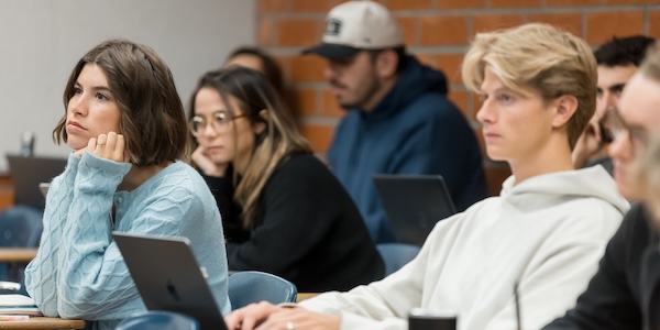 Students sitting at their desks during class.