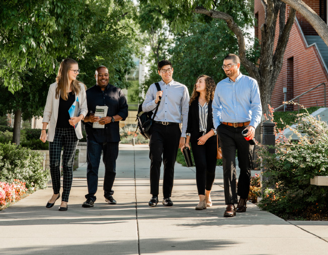 a group of young men and women walking together