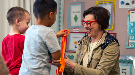 A teacher working with students