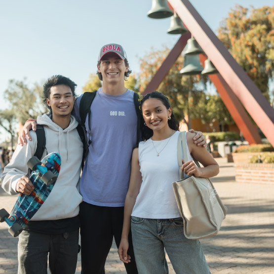 three young people smiling