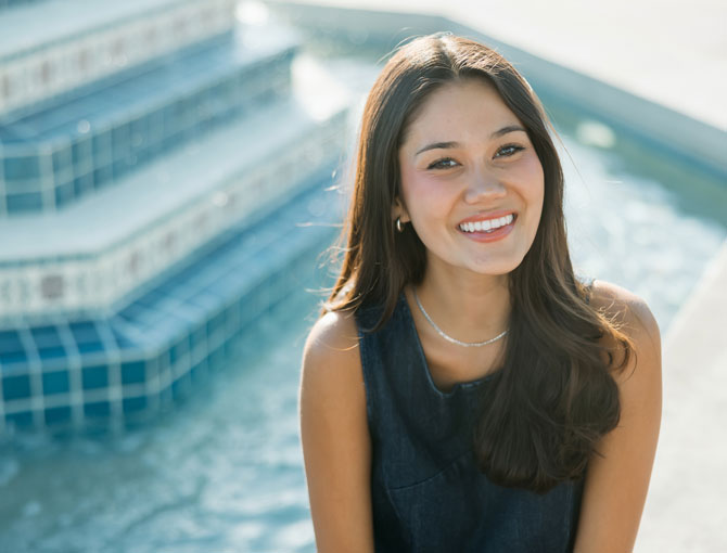 A student smiling