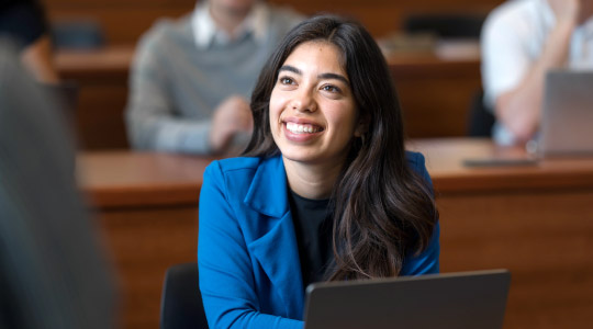 Business student looking up in class