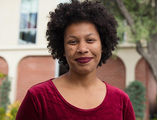 A female student smiles