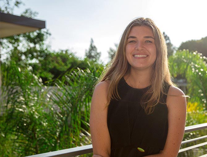 A student smiles by Calvary Chapel