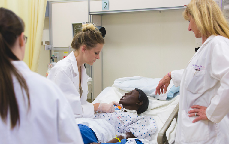 Nursing students in lab setting