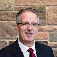headshot of DeYoung