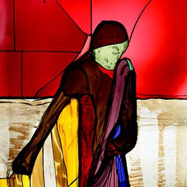Stained glass depicting a sower with a red sky