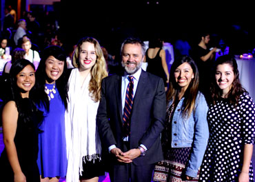 Students posing with president Barry Corey