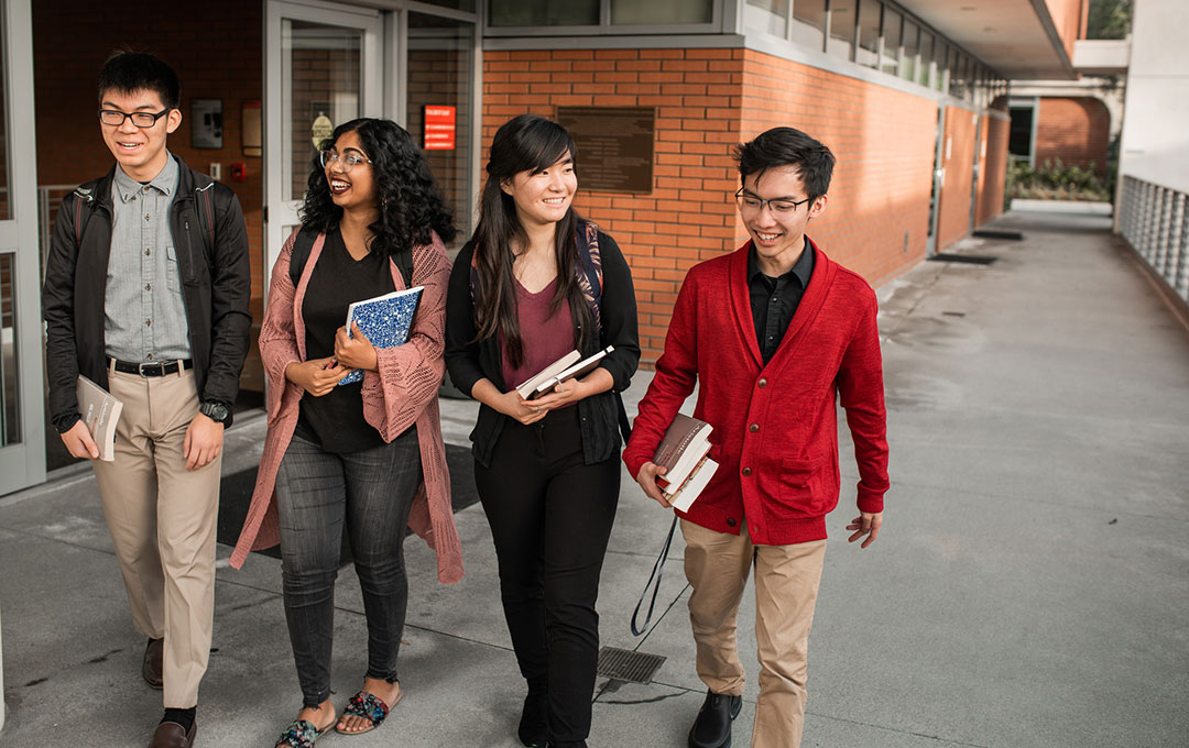 Students walking on campus.