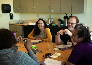 Photo of small group engaging during Symphony