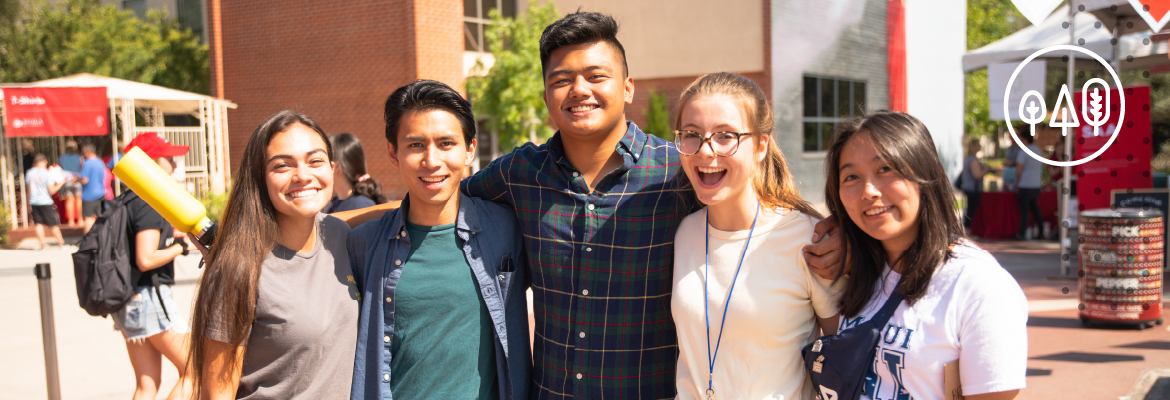 Students smiling at University Welcome Day