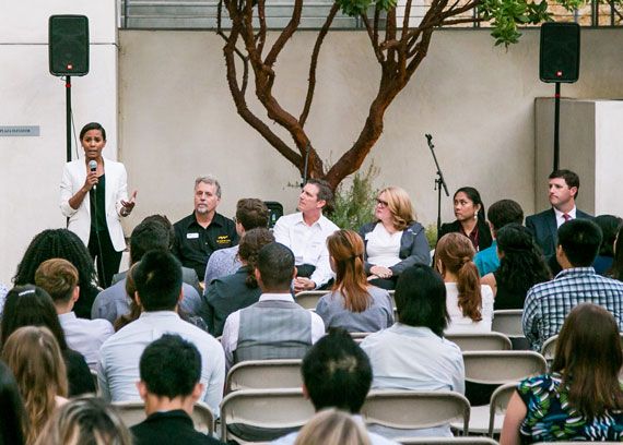 professional woman speaking to an audience