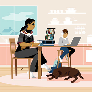 A professional woman works from home, next to her son and dog.