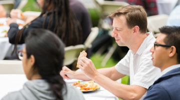 People eating during a lunch event