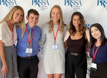Students standing together at a PRSSA event