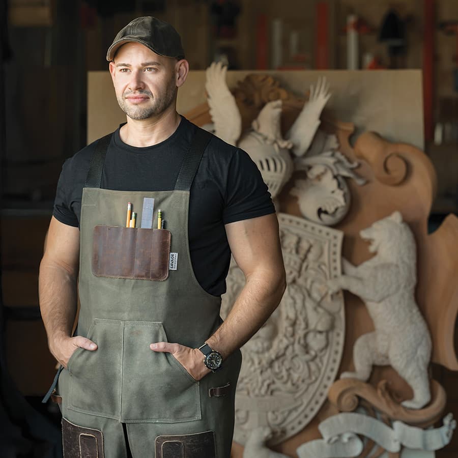 Jake Weidmann standing in his studio