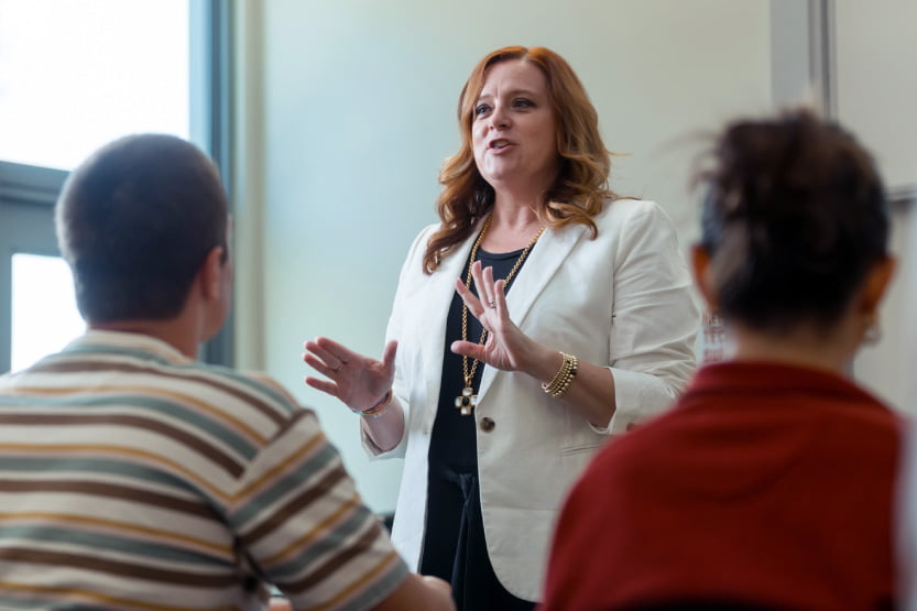a professor speaking to a class