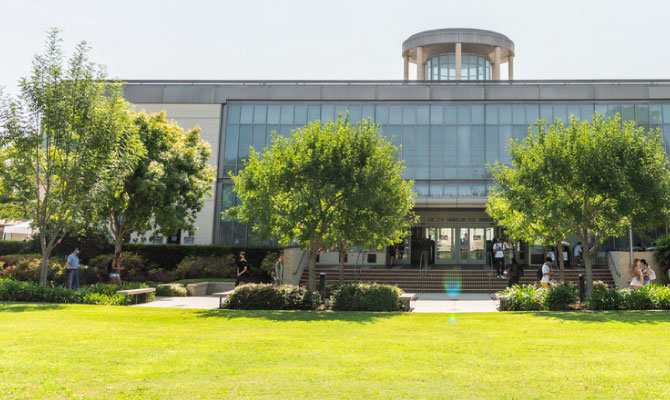 Outside of library building with lawn in front