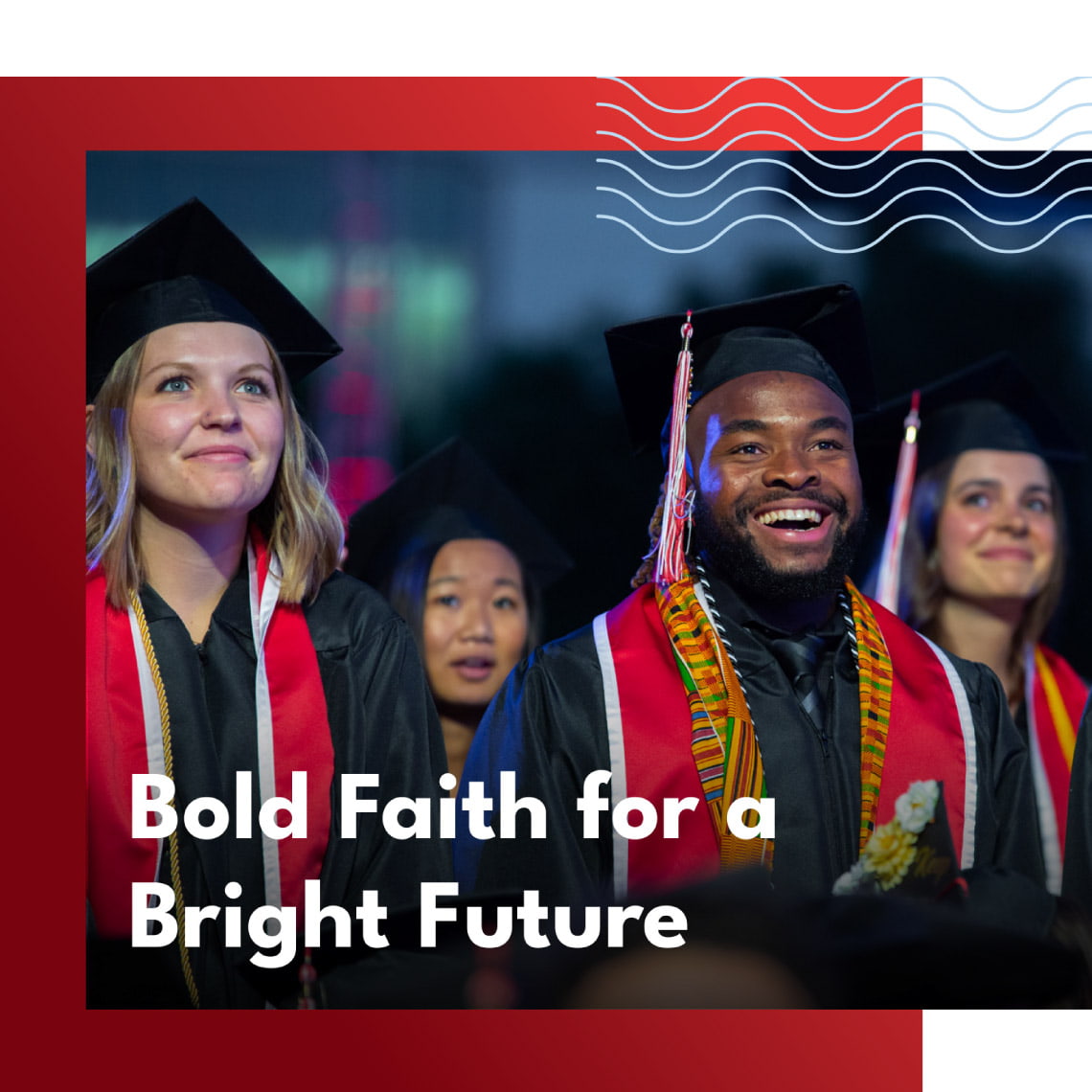 smiling young people wearing caps and gowns