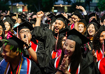 students in graduation cap and gown