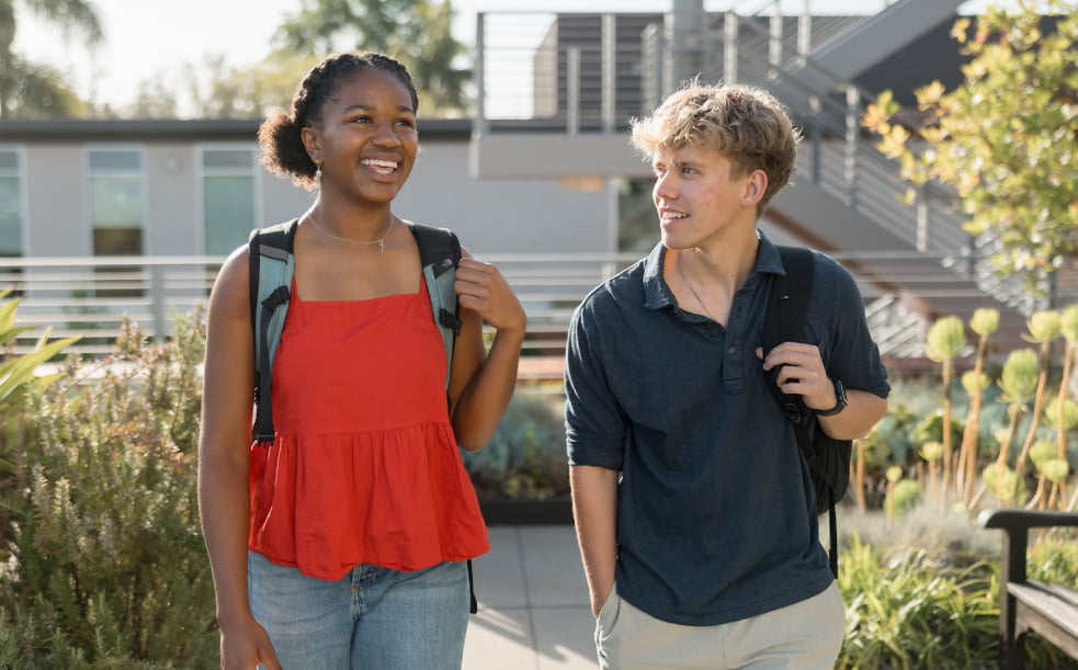 two young people smiling