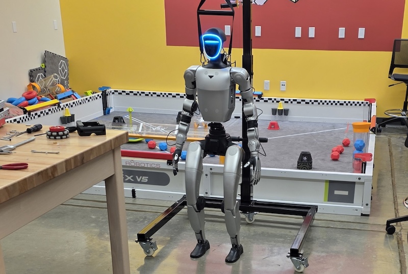 A student-built robot standing inside the robotics laboratory