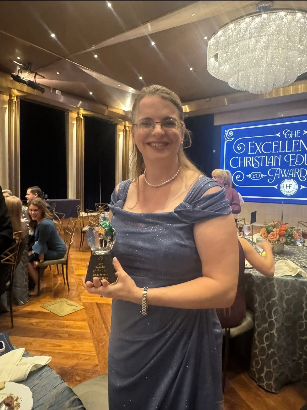 Image shows Emily Zybach with her award