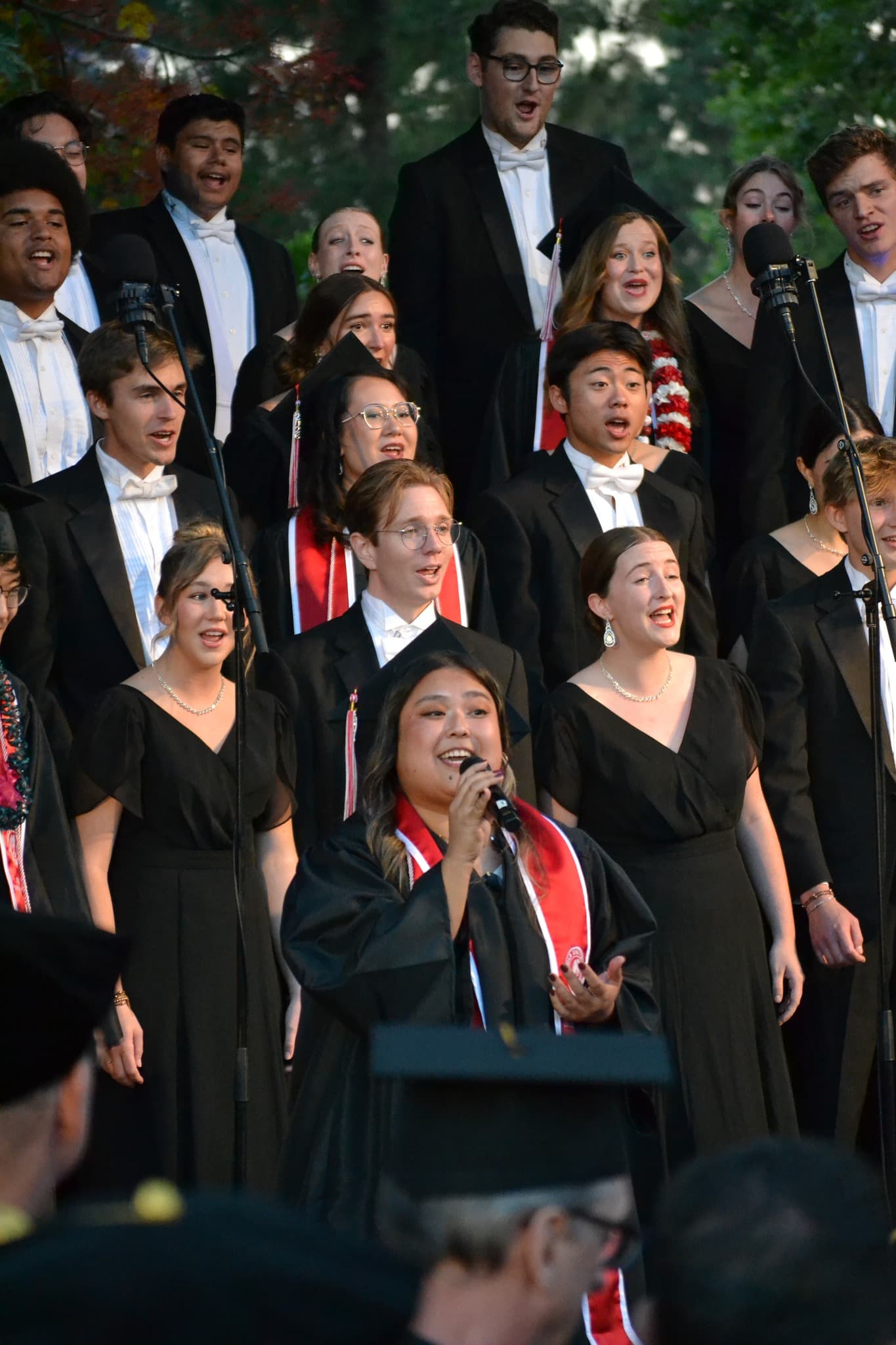 image shows students singing in the Chorale