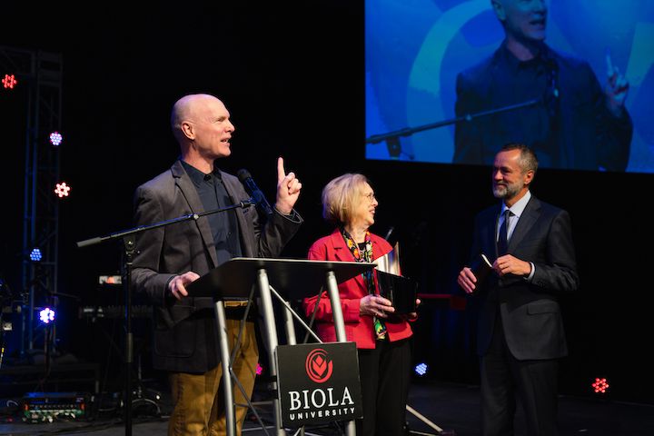 Image shows Kevin Palau speaking at the award ceremony