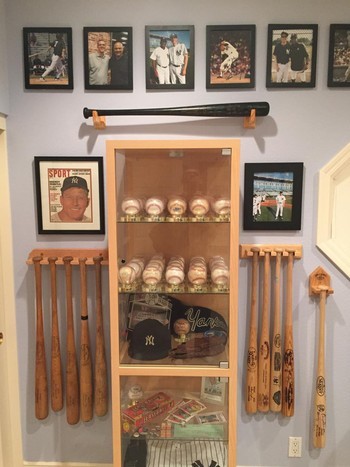 Display of baseball bats, balls and photos