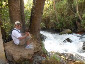 Ivan sitting near Banias Springs/River