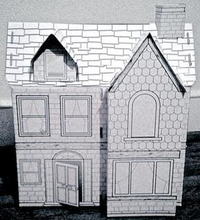 Cardboard cutout of a home