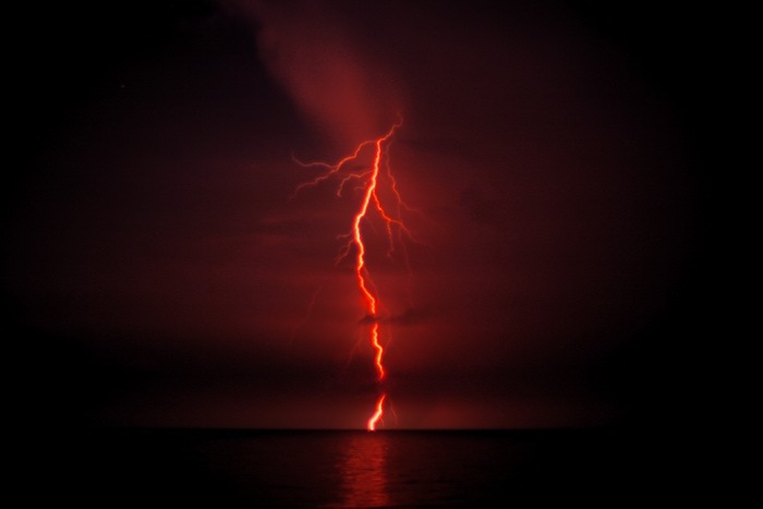 Bolt of lightning hitting the ocean