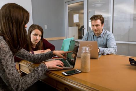 Students collaborating in study room